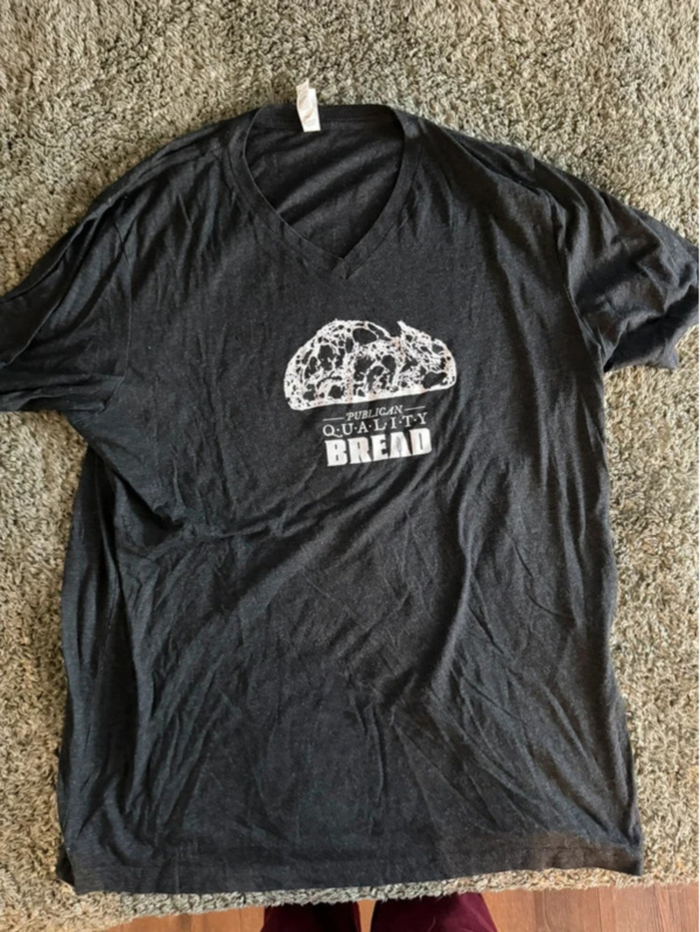 Bella+Canvas Black V-Neck T-Shirt with Publican Quality Bread Graphic